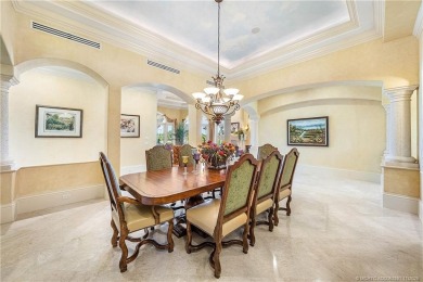 Water, water everywhere! This stunning Sailfish Point residence