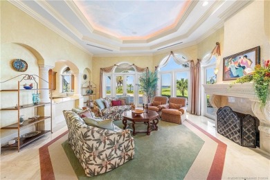 Water, water everywhere! This stunning Sailfish Point residence