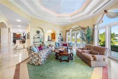 Water, water everywhere! This stunning Sailfish Point residence