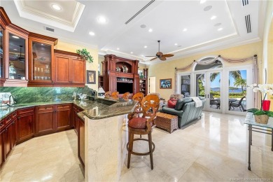Water, water everywhere! This stunning Sailfish Point residence