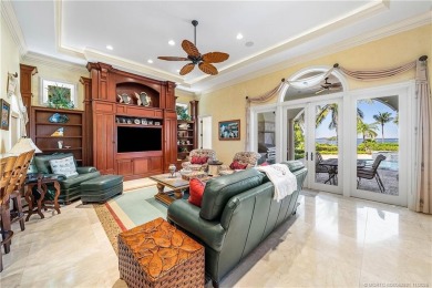 Water, water everywhere! This stunning Sailfish Point residence