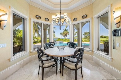 Water, water everywhere! This stunning Sailfish Point residence
