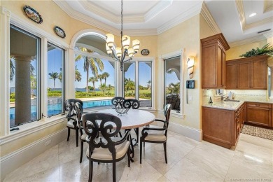 Water, water everywhere! This stunning Sailfish Point residence