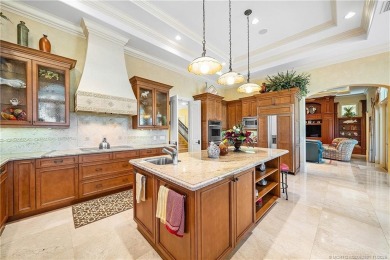 Water, water everywhere! This stunning Sailfish Point residence