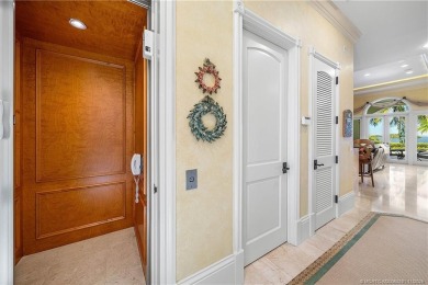 Water, water everywhere! This stunning Sailfish Point residence