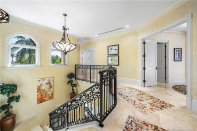 Water, water everywhere! This stunning Sailfish Point residence