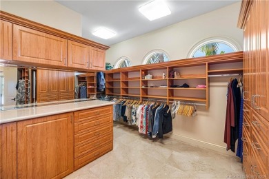 Water, water everywhere! This stunning Sailfish Point residence