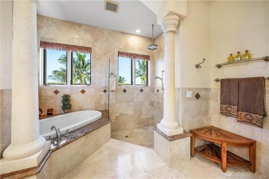 Water, water everywhere! This stunning Sailfish Point residence