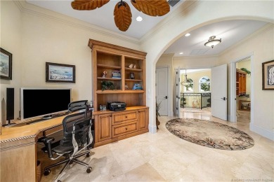 Water, water everywhere! This stunning Sailfish Point residence