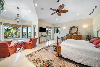 Water, water everywhere! This stunning Sailfish Point residence