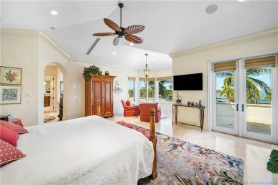 Water, water everywhere! This stunning Sailfish Point residence
