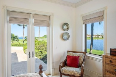 Water, water everywhere! This stunning Sailfish Point residence