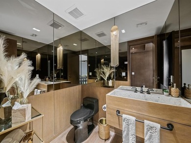 Indulge in elevated waterfront living at  the Adagio. This 3Bed