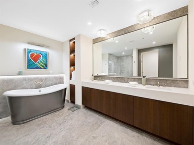 Indulge in elevated waterfront living at  the Adagio. This 3Bed