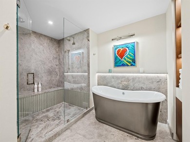 Indulge in elevated waterfront living at  the Adagio. This 3Bed