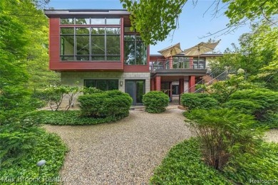 Architectural Masterpiece placed on a ravine lot just steps from