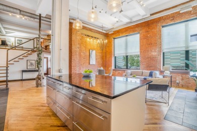 Welcome to Unit 103 at 1439 S Michigan Ave, a spacious and truly