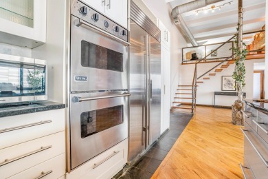 Welcome to Unit 103 at 1439 S Michigan Ave, a spacious and truly