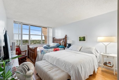 Penthouse living with golf course views in a sought-after 55+