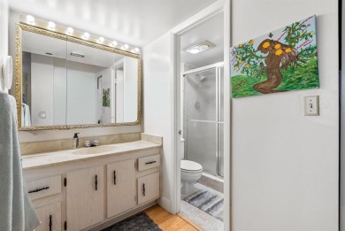 Penthouse living with golf course views in a sought-after 55+