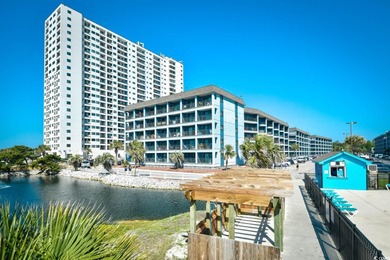 This TOTALLY REMODELED  Turnkey ocean view 2 bedroom unit is a