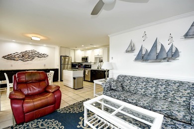 This TOTALLY REMODELED  Turnkey ocean view 2 bedroom unit is a