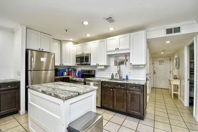 This TOTALLY REMODELED  Turnkey ocean view 2 bedroom unit is a