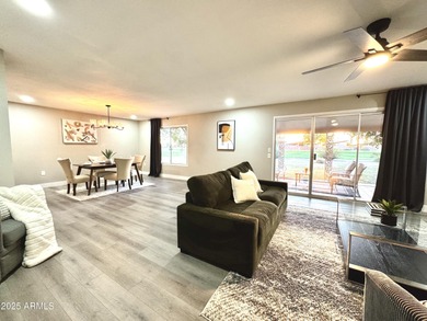 Beautifully updated home on a Golf Course Lot! Wood-look