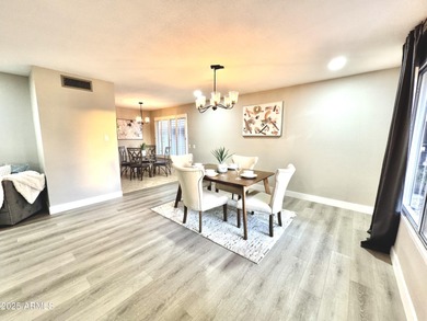 Beautifully updated home on a Golf Course Lot! Wood-look