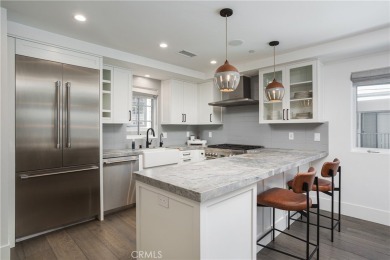 Set on a quiet street in the heart of Corona del Mar's Village