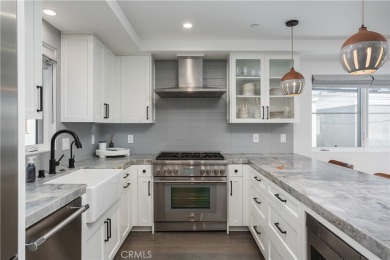 Set on a quiet street in the heart of Corona del Mar's Village