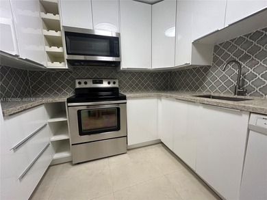 Welcome to this beautifully maintained 2-2 condo on the 17th