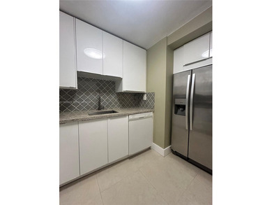 Welcome to this beautifully maintained 2-2 condo on the 17th