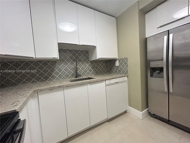 Welcome to this beautifully maintained 2-2 condo on the 17th