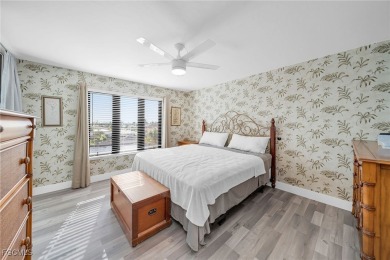 Renovated - NEW AC, corner unit offers wide canal, partial river