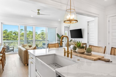 Nestled in the brand-new gated community of Bluewater Landing