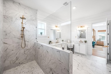 Nestled in the brand-new gated community of Bluewater Landing