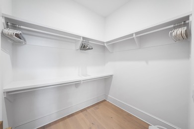 Nestled in the brand-new gated community of Bluewater Landing