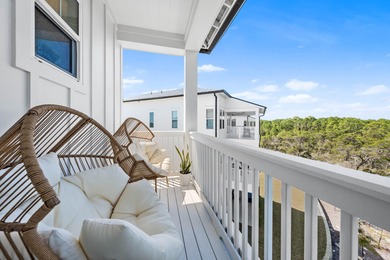 Nestled in the brand-new gated community of Bluewater Landing