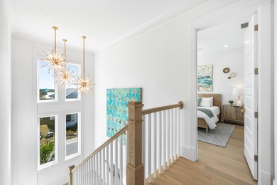 Nestled in the brand-new gated community of Bluewater Landing