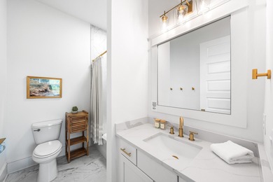 Nestled in the brand-new gated community of Bluewater Landing