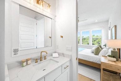 Nestled in the brand-new gated community of Bluewater Landing