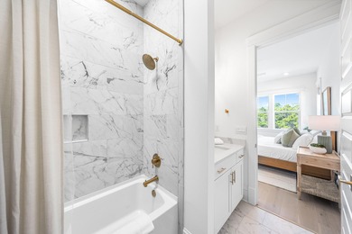 Nestled in the brand-new gated community of Bluewater Landing