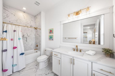 Nestled in the brand-new gated community of Bluewater Landing