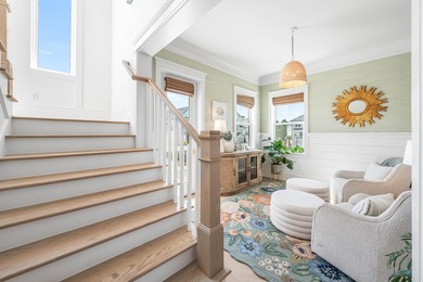 Nestled in the brand-new gated community of Bluewater Landing