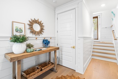 Nestled in the brand-new gated community of Bluewater Landing