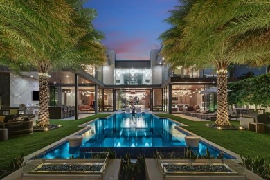 An unparalleled gated waterfront estate located on the deep