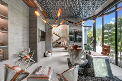 An unparalleled gated waterfront estate located on the deep