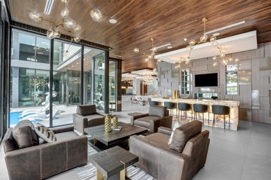 An unparalleled gated waterfront estate located on the deep