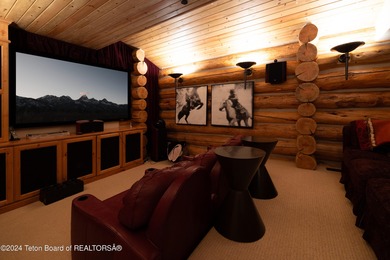 Set on the Snake River with 42.57 acres & dramatic Teton views